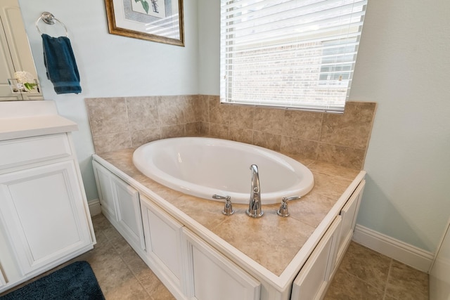 804 Countryside Way, Little Elm, TX 76227 - full bath with a garden tub, tile patterned flooring, vanity, and baseboards