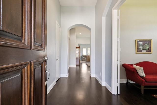 804 Countryside Way, Little Elm, TX 76227 - corridor featuring arched walkways, dark wood-style floors, and baseboards