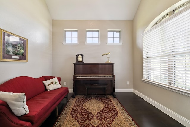 804 Countryside Way, Little Elm, TX 76227 - living area featuring vaulted ceiling, baseboards, and wood finished floors