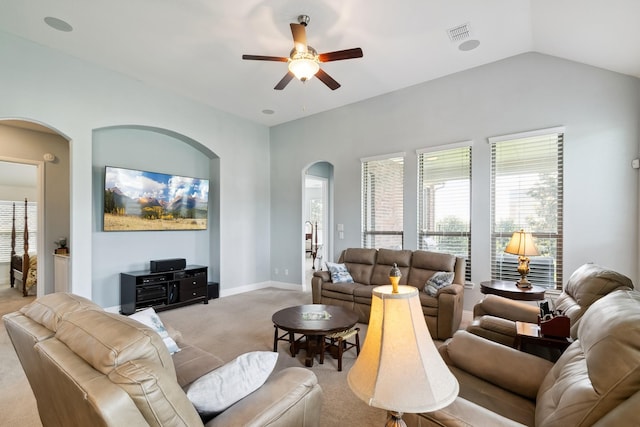 804 Countryside Way, Little Elm, TX 76227 - living room with arched walkways, ceiling fan, light colored carpet, vaulted ceiling, and baseboards