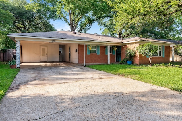 252 Brenda Dr, Shreveport, LA 71115 - ranch-style house featuring brick siding, concrete driveway, and an attached carport