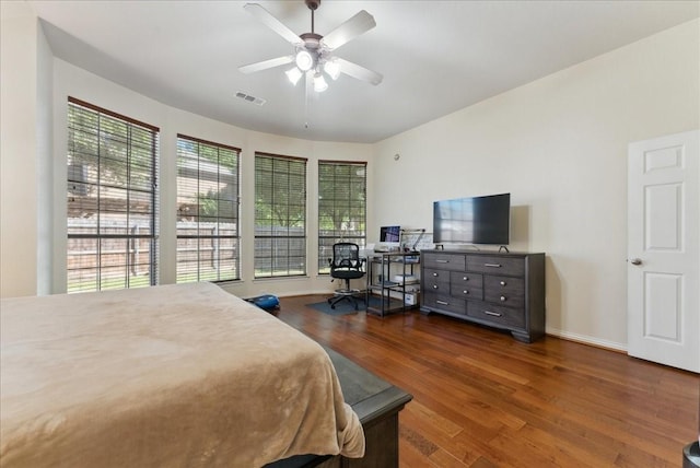 2652 Waterway Dr, Grand Prairie, TX 75054 - bedroom featuring wood finished floors, baseboards, and a ceiling fan