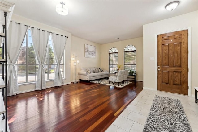 2652 Waterway Dr, Grand Prairie, TX 75054 - entrance foyer featuring baseboards and wood finished floors