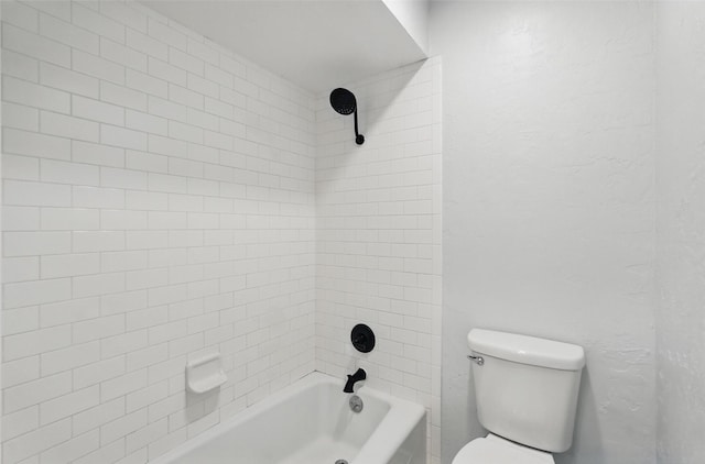 bathroom with toilet and shower / bath combination