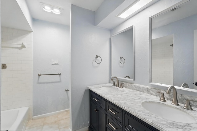 full bath with tile patterned flooring and double vanity