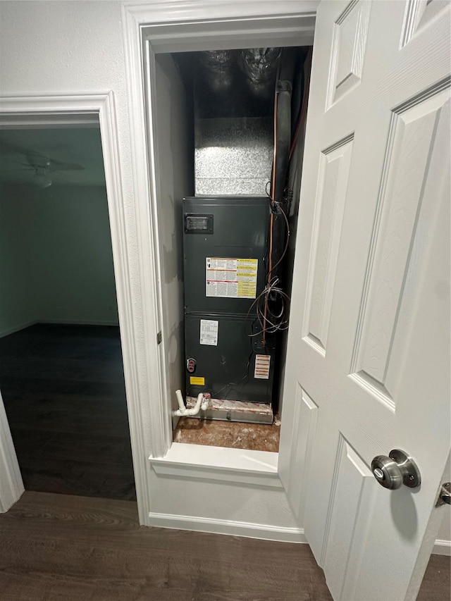 utility room with heating unit