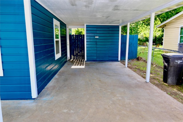 view of patio featuring fence