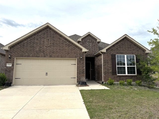 3340 Sorghum Way, Mckinney, TX 75071 - view of front facade with concrete driveway, an attached garage, brick siding, and a front lawn
