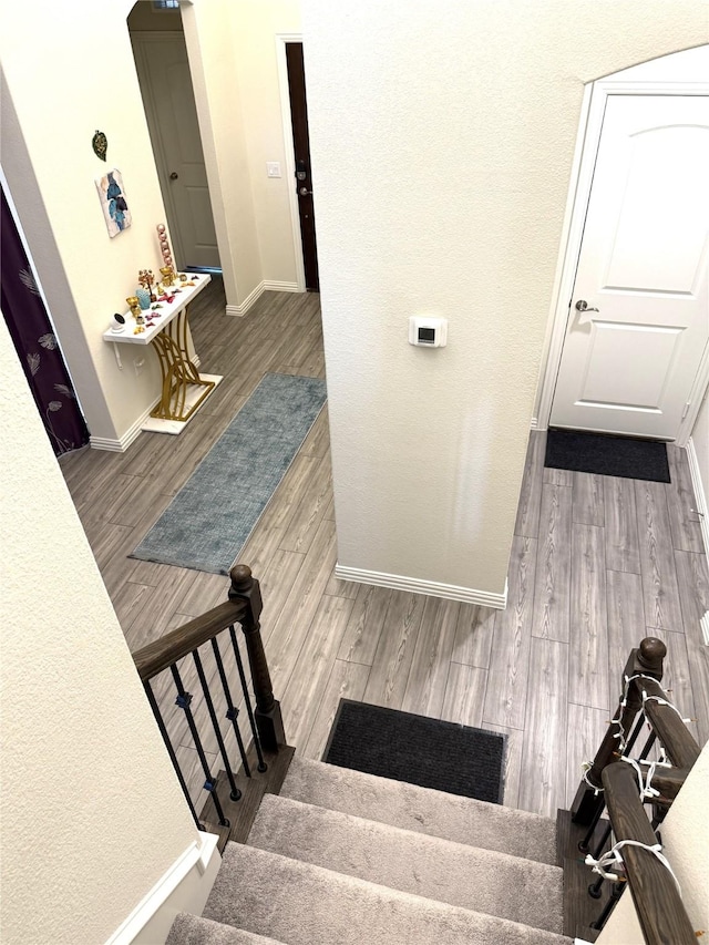 3340 Sorghum Way, Mckinney, TX 75071 - staircase featuring baseboards and wood finished floors