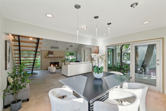 957 Easton Pl, Dallas, TX 75218 - dining space featuring plenty of natural light, a lit fireplace, and recessed lighting