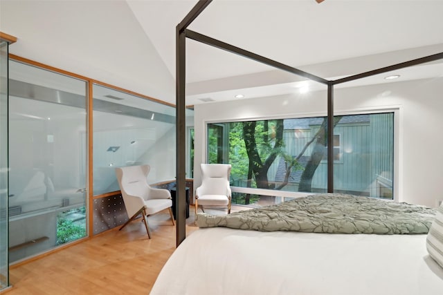 957 Easton Pl, Dallas, TX 75218 - bedroom with wood finished floors and vaulted ceiling