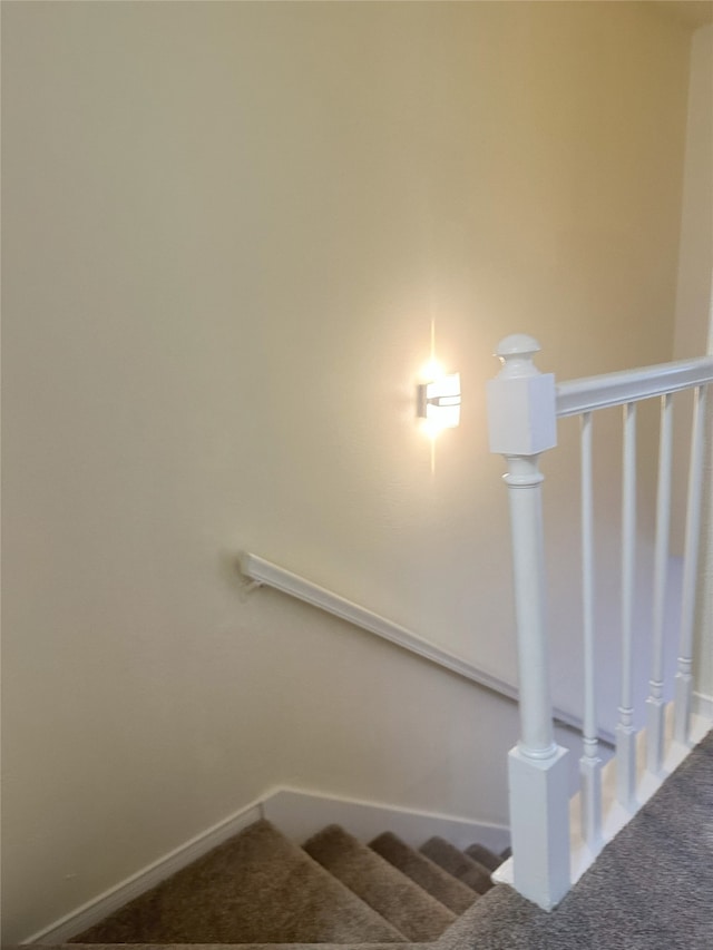 12921 Abrams Rd Unit 407, Dallas, TX 75243 - stairs featuring carpet floors and baseboards