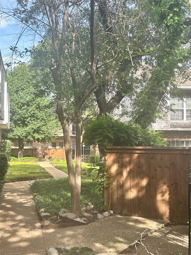 12921 Abrams Rd Unit 407, Dallas, TX 75243 - view of yard featuring fence