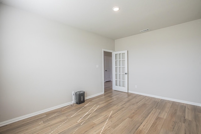 146 Chester Rd, Springtown, TX 76082 - unfurnished room with light wood-type flooring, baseboards, and recessed lighting