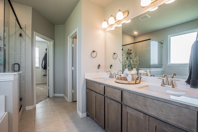 146 Chester Rd, Springtown, TX 76082 - full bathroom with a stall shower, double vanity, and baseboards