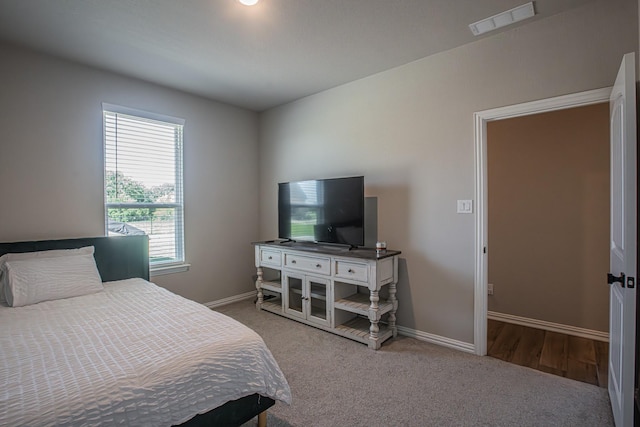 146 Chester Rd, Springtown, TX 76082 - carpeted bedroom featuring baseboards
