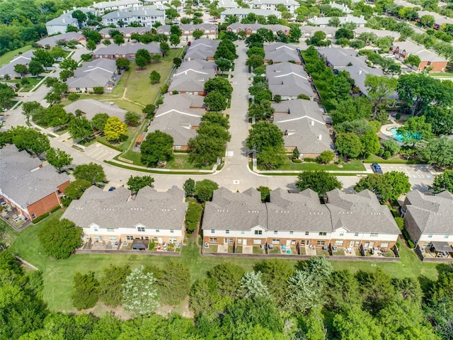 aerial view of property's location with nearby suburban area