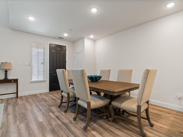 7335 Panicum Dr, Frisco, TX 75033 - dining space featuring baseboards, light wood finished floors, and recessed lighting