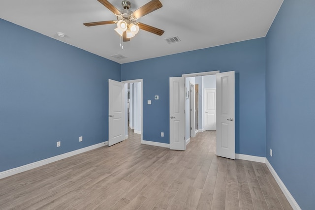 516 Smart Strike Trl, Granbury, TX 76049 - unfurnished bedroom featuring light wood finished floors, baseboards, and ceiling fan