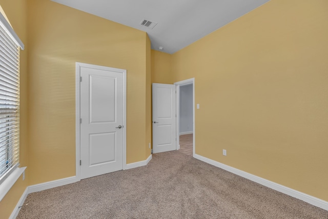 516 Smart Strike Trl, Granbury, TX 76049 - unfurnished bedroom featuring carpet floors and baseboards