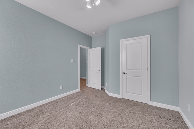 516 Smart Strike Trl, Granbury, TX 76049 - unfurnished bedroom with carpet flooring and baseboards