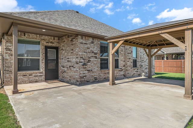 516 Smart Strike Trl, Granbury, TX 76049 - view of patio featuring a gazebo and fence