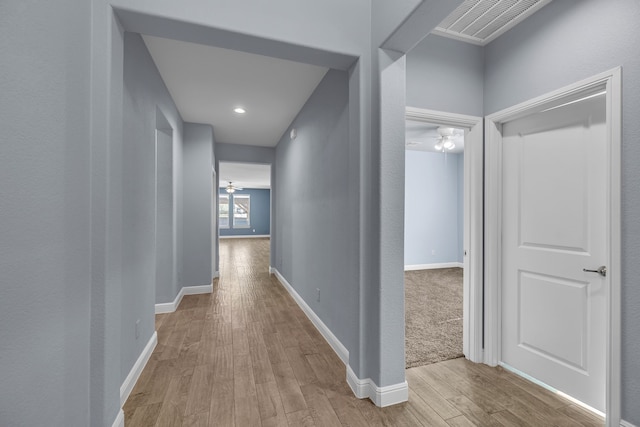 516 Smart Strike Trl, Granbury, TX 76049 - hallway featuring light wood-style floors and baseboards