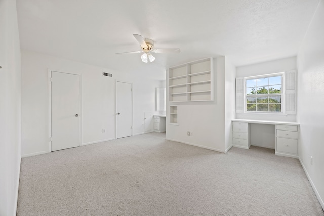 7609 Spring Valley Rd, Dallas, TX 75254 - unfurnished living room featuring light carpet, ceiling fan, and baseboards