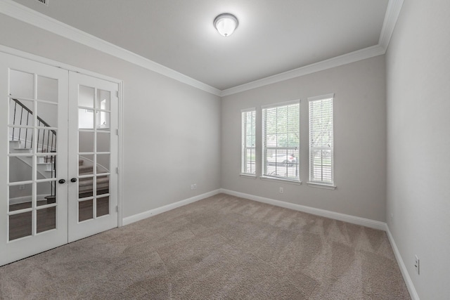 670 Bridge St, Coppell, TX 75019 - empty room with french doors, carpet flooring, ornamental molding, and baseboards