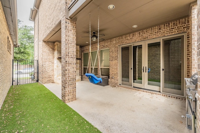 670 Bridge St, Coppell, TX 75019 - view of patio with ceiling fan and french doors
