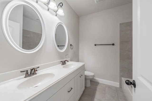670 Bridge St, Coppell, TX 75019 - full bath with double vanity, toilet, tile patterned flooring, baseboards, and  shower combination