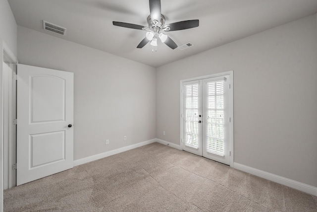 670 Bridge St, Coppell, TX 75019 - spare room with carpet, ceiling fan, baseboards, and french doors