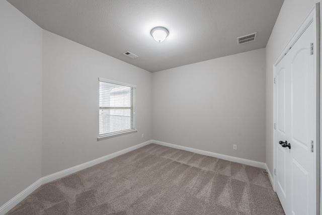 670 Bridge St, Coppell, TX 75019 - spare room featuring light colored carpet and baseboards