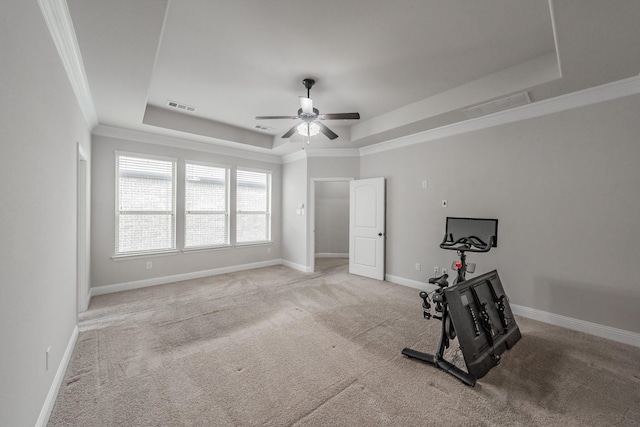 670 Bridge St, Coppell, TX 75019 - workout room with a raised ceiling, a ceiling fan, light carpet, ornamental molding, and baseboards
