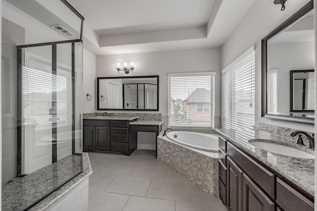 670 Bridge St, Coppell, TX 75019 - full bath with a shower stall, a garden tub, two vanities, and tile patterned flooring