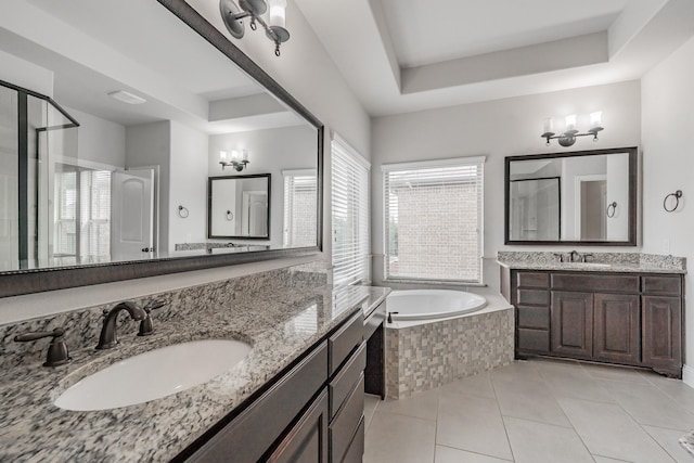 670 Bridge St, Coppell, TX 75019 - bathroom with a garden tub, a stall shower, tile patterned floors, two vanities, and a tray ceiling