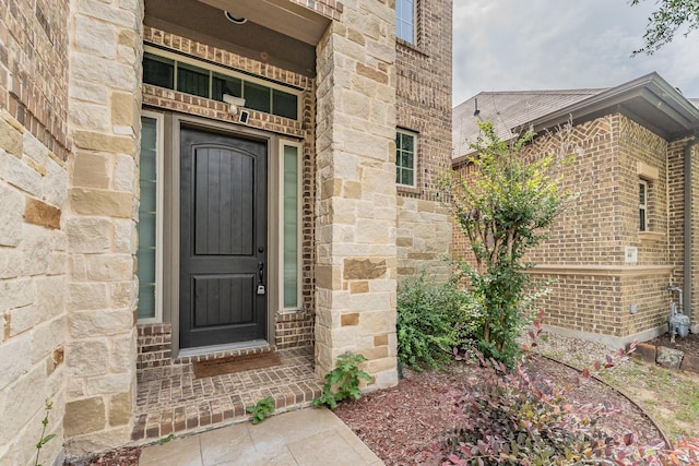 670 Bridge St, Coppell, TX 75019 - property entrance featuring brick siding and stone siding