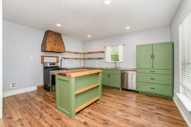 301 Sycamore St, Bardwell, TX 75101 - kitchen with green cabinetry, open shelves, butcher block countertops, appliances with stainless steel finishes, and recessed lighting