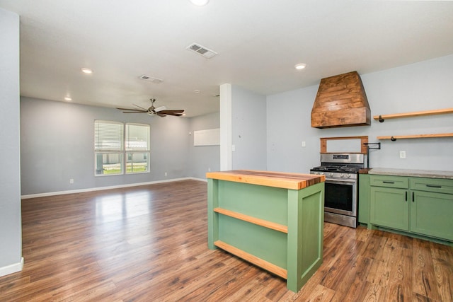 301 Sycamore St, Bardwell, TX 75101 - kitchen featuring green cabinetry, open shelves, stainless steel gas stove, wood counters, and dark wood finished floors