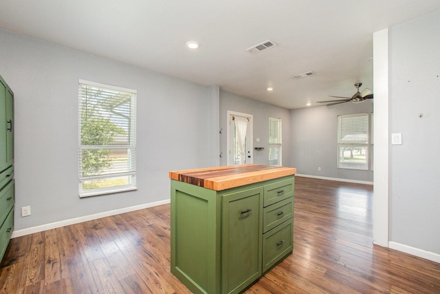 301 Sycamore St, Bardwell, TX 75101 - kitchen featuring green cabinets, wooden counters, healthy amount of natural light, baseboards, and recessed lighting
