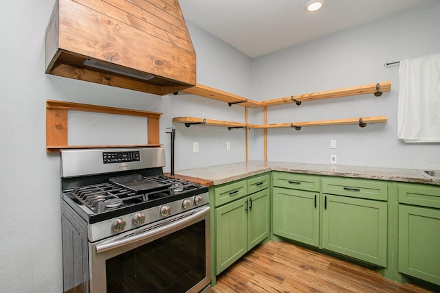 301 Sycamore St, Bardwell, TX 75101 - kitchen featuring stainless steel gas range oven, open shelves, light wood-style flooring, green cabinetry, and recessed lighting