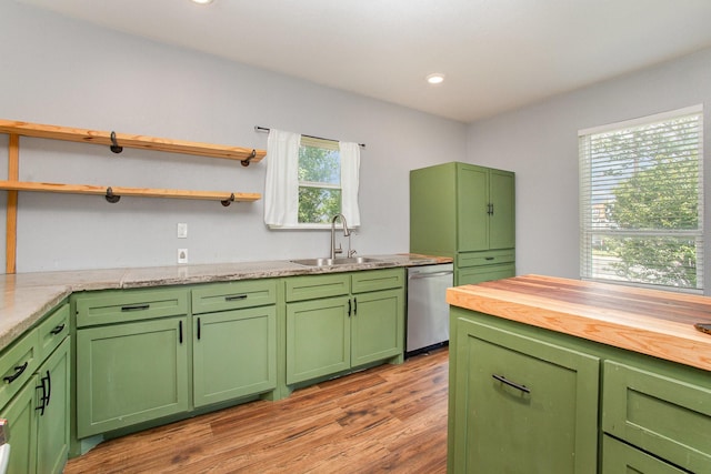 301 Sycamore St, Bardwell, TX 75101 - kitchen with dishwasher, a sink, butcher block countertops, light wood-style floors, and open shelves
