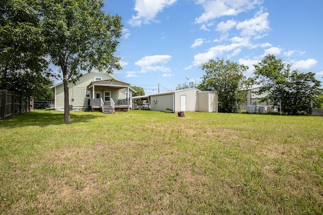 301 Sycamore St, Bardwell, TX 75101 - view of yard featuring an outbuilding and a porch