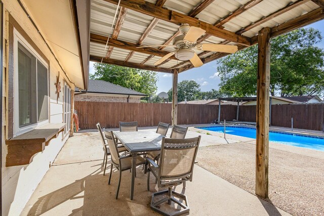3105 Kensington Dr, Mesquite, TX 75150 - view of patio / terrace with a fenced backyard, outdoor dining area, and ceiling fan