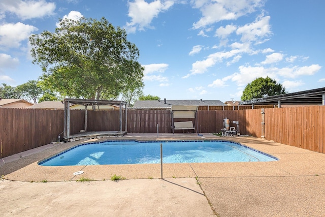 3105 Kensington Dr, Mesquite, TX 75150 - view of pool with a patio area and a fenced backyard