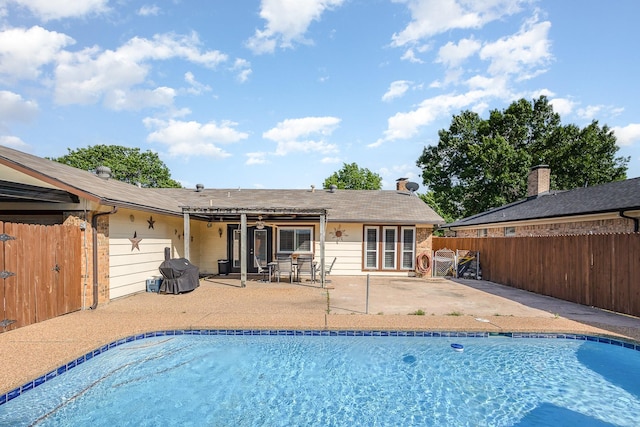 3105 Kensington Dr, Mesquite, TX 75150 - view of pool featuring fence and a patio