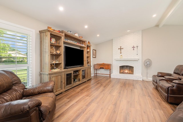 3105 Kensington Dr, Mesquite, TX 75150 - living area with light wood-style flooring, recessed lighting, a brick fireplace, and baseboards