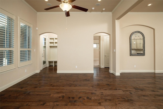 3900 Plum Vista Pl, Arlington, TX 76005 - unfurnished room with arched walkways, crown molding, a ceiling fan, dark wood-style flooring, and baseboards