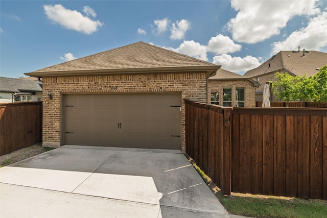 3900 Plum Vista Pl, Arlington, TX 76005 - garage featuring driveway and fence