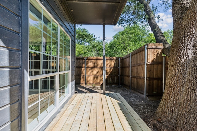 7525 Holly Hill Dr Unit 17, Dallas, TX 75231 - wooden deck featuring a fenced backyard